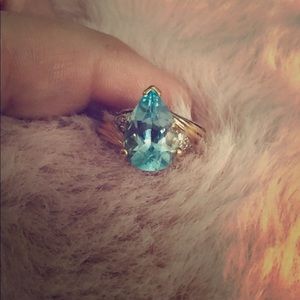 Aquamarine gold and diamond ring
